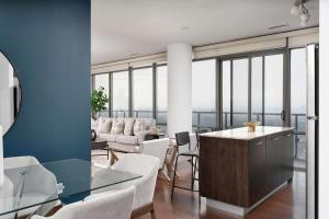 Above the City Designer Sub-Penthouse Oasis
