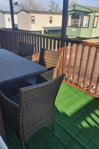 Wooden Lodge Sleeps 9 with Veranda & Decking