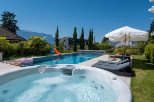 Luxury 5-Bedroom Villa with Pool Garden & Lake Geneva Views by GuestLee