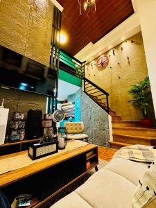 Cozy 2BR Loft in EDSA with Rooftop Pool