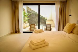 Villa Privative avec piscine chauffée, spa, salle de sport et services hoteliers