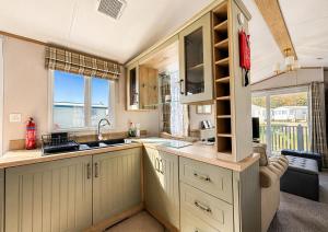 Homely Caravan With Decking At North Denes In Suffolk, Ref 40119And