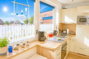 3-Sterne Ferienwohnung Deichgraf A-8, Nordsee Burhave mit Balkon, Parkplatz, Pool & Sauna, WLAN