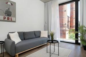 Piekarnia Modern Studio with a Balcony and a Workspace by Noclegi Renters