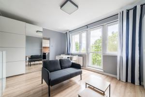 Grunwald Comfort Apartment by BookingHost