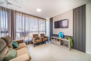 Djalma 105 - Apartamento Amplo com 3 Suítes no Centro de Bombinhas.