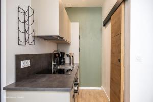 Appartement rénové en plein coeur de ville