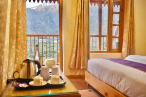 The Peach Hillside, Kainchi Dham