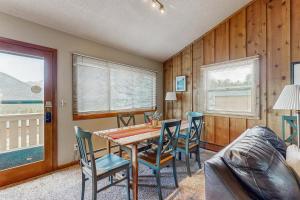 Enjoy Nature from this Charming Cabin with Deck, Fireplace, & Washer and Dryer