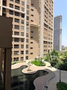 Modern 2BHK with pool & wifi at GIFT CITY