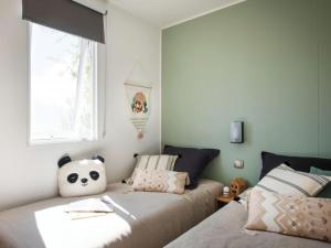 Mobil-home climatisé - 4 pers., animaux OK - API-1-52-2903