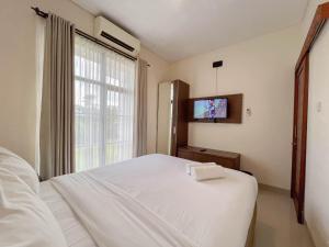 Spacious and Homey 3BR at Villa Casa De Uli By Travelio