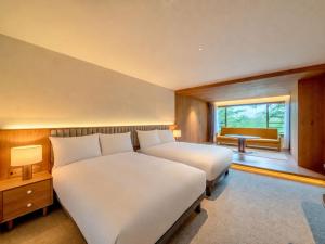 UNWIND HOTEL & BAR Okunikko