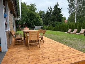 Mazury Dom Oluś nad jeziorem Sasek Wielki z gorącą balia z funkcją jakuzzi