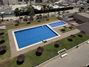 Apartamento con piscina, gimnasio y parking en Alicante by Turihome