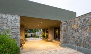 Stone Age home 4-BHK Stone-Clad Villa with Private Pool, Terrace Garden & Gazebo