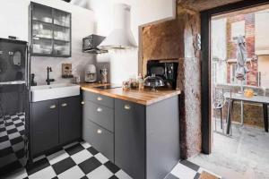 La Suite Años 20 Bañera, chimenea de leña y terraza