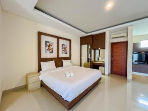 Serene Designed and Homey Studio at Villa Casa De Uli By Travelio