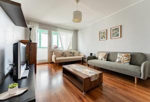 Przymorze Homely Apartment by BookingHost