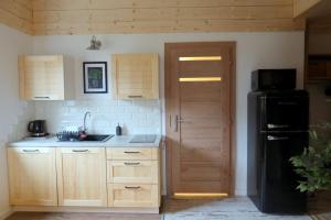 APARTAMENT Z OGRÓDKIEM - DoM NAD MORZEM, TARAS WIDOKOWY ZE STREFĄ WYPOCZYNKU, SALA ZABAW