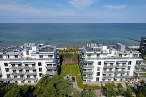 Stylowe Studio z Klimatyzacją i Parkingiem Blisko Plaży by Noclegi Renters