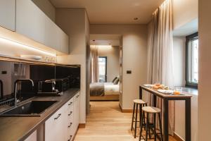 Grava Aurum - City Suites