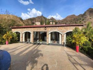 Clubhouse Resort Swarnagarh Udaipur by CheckIn