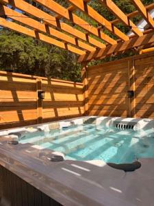 Log cabin with SPA, pool, and small beach