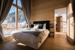 Chalets Les Portes de Megeve : photos des chambres