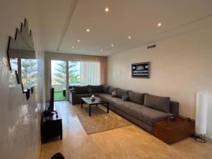 Cozy home with beach view & pool at Evasion Bouznika
