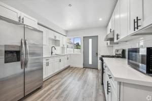 MH 1419 West 35th Street Los Angeles, CA 90018