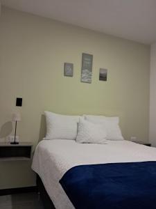 7min del Parque Central, céntrico, impecable, parqueo Apto de 2 Habitaciones