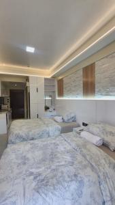eHOME LUXX CONDOMINIUM