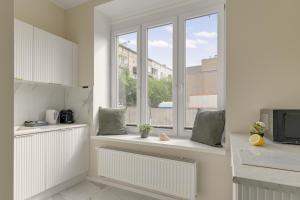 Sukiennicza Family Suite near WWII Museum by Downtown Apartments