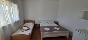 Simple beachfront rooms Bego