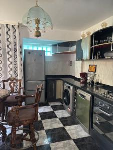 plaja apartament cu scara interioara