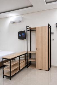Djuragan Kamar Labuhan