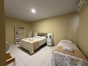 Casa mobiliada AR01 com 5 camas e 2 quartos