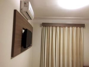 Flat com lazer completo e vista para a Serra