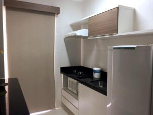 Flat com lazer completo e vista para a Serra