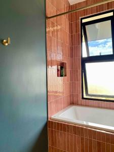 Private home in Playa Potrero near Flamingo with Infinity pool, 9 minute walk to beach, ocean, mountain, nature views, TV and AC in every room