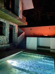 Private home in Playa Potrero near Flamingo with Infinity pool, 9 minute walk to beach, ocean, mountain, nature views, TV and AC in every room