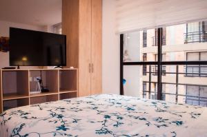 Apartamento Central-Silencioso con Parquedero y WiFi 900mbps