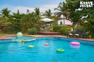 StayVistas Tarikas Goldshore - Varca - 3BHK Pet-Friendly Villa with Shared Pool