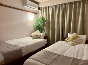Atami 10 min walk to town and the ocean Spacious yard
