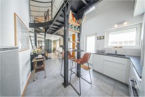 Maison de pêcheur rénovée face à lembarcadère