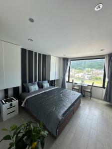 Grand Patong Service Apartment Black&White