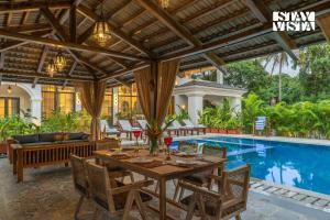 StayVista at Casa Dos Reis with Lawn & Pool