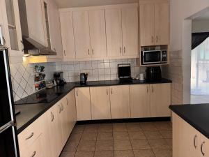 Spacious 4 Bedroom house,Pool,2 En-suites