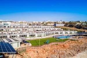 Dog-friendly home 3 rows to beach with rooftop deck, pool, & kitchen